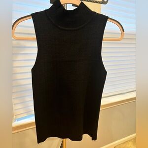 Black sparkly mock neck shirt.